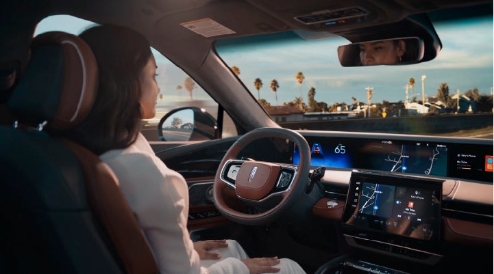 A person is shown driving hands-free on the highway with available Lincoln BlueCruise technology. | Sentry Lincoln in Medford MA