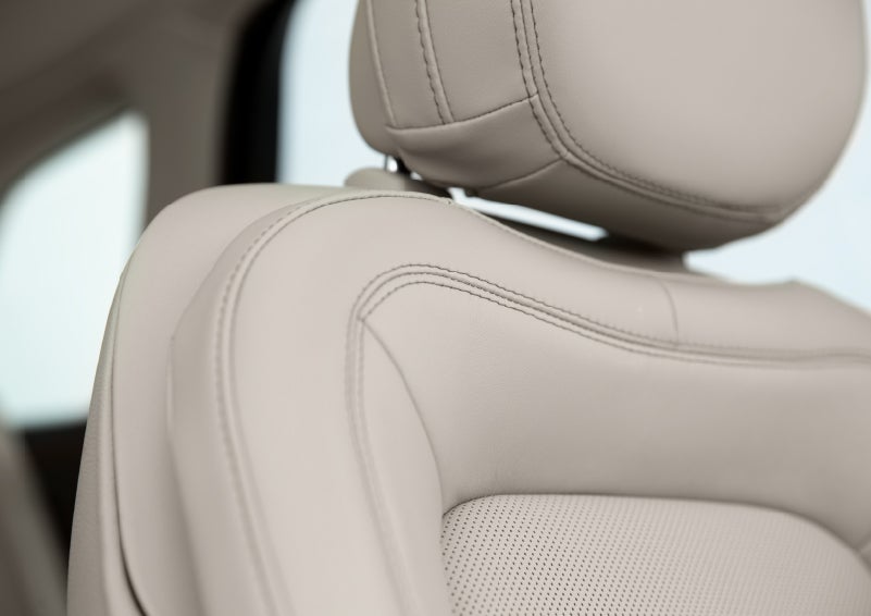 A detail shot of available leather-trimmed Perfect Position front seat shows off artistic details like luxe materials, precision stitching and supple curves | Sentry Lincoln in Medford MA