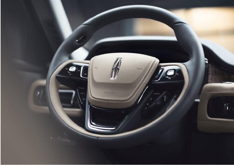 The intuitively placed controls of the steering wheel on a 2023 Lincoln Aviator® SUV | Sentry Lincoln in Medford MA