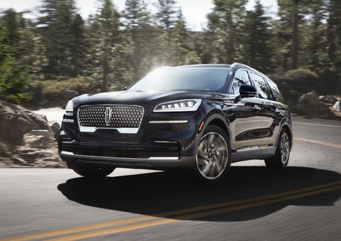 A Lincoln Aviator® SUV is being driven on a winding mountain road | Sentry Lincoln in Medford MA
