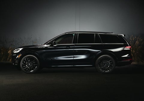 A 2024 Lincoln Aviator® SUV is shown in the Infinite Black exterior color | Sentry Lincoln in Medford MA