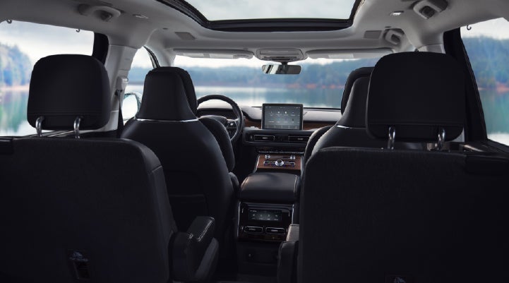 The interior of a 2024 Lincoln Aviator® SUV from behind the second row | Sentry Lincoln in Medford MA