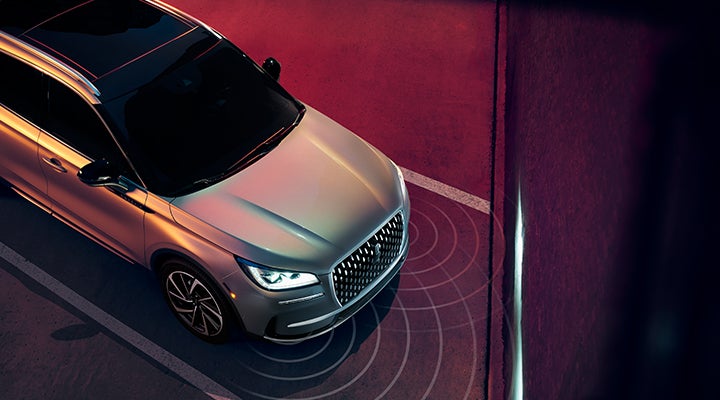 Illustrated radar signals are shown emitting from the front of a 2024 Lincoln Corsair® SUV. | Sentry Lincoln in Medford MA