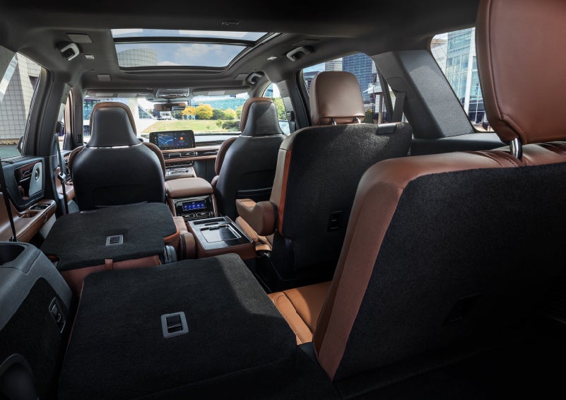 The interior of the 2025 Lincoln Aviator® SUV is shown with two seats folded down for added space. | Sentry Lincoln in Medford MA