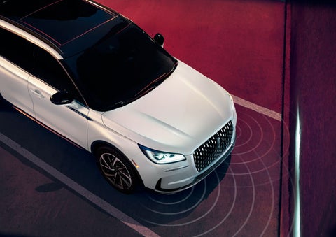 Illustrated radar signals are shown emitting from the front of a 2025 Lincoln Corsair® SUV. | Sentry Lincoln in Medford MA