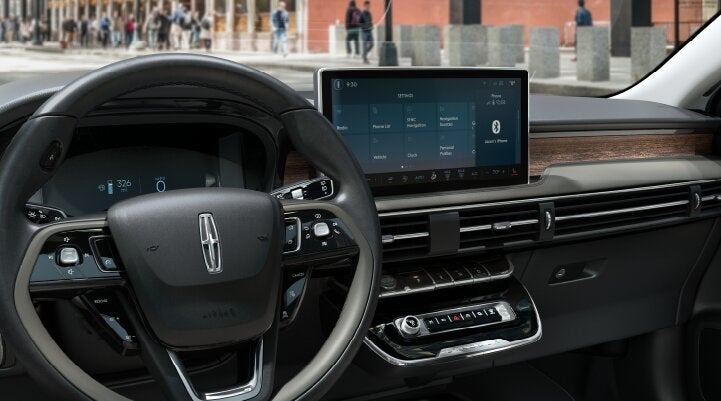 The center screen of the new 2025 Lincoln Corsair® SUV is showcased with its SYNC® 4 capabilities highlighted | Sentry Lincoln in Medford MA