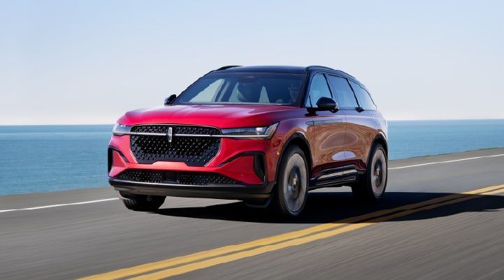 A 2025 Lincoln Nautilus® SUV is being driven on a seaside roadway. | Sentry Lincoln in Medford MA