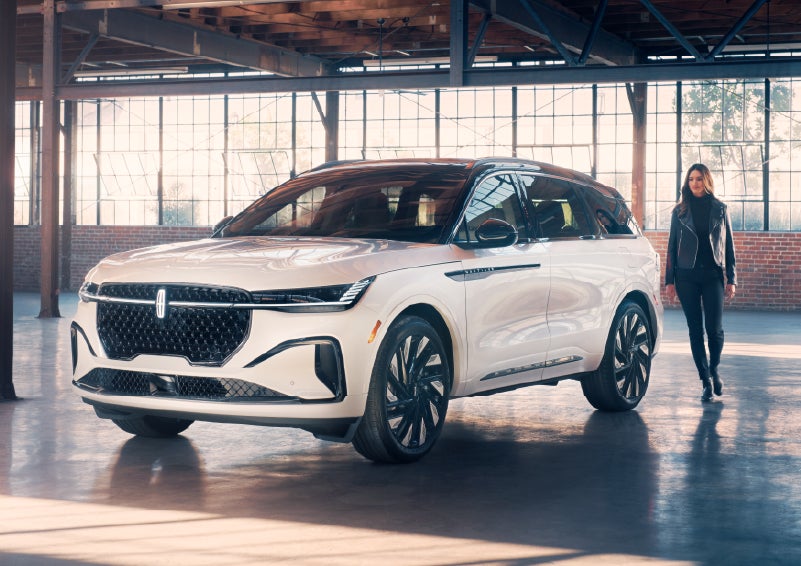 A person approaches a 2025 Lincoln Nautilus® SUV. | Sentry Lincoln in Medford MA