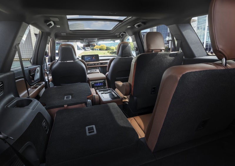 One side of the PowerFold® third-row seat and a second-row seat are folded forward in the 2026 Lincoln Aviator® SUV. | Sentry Lincoln in Medford MA
